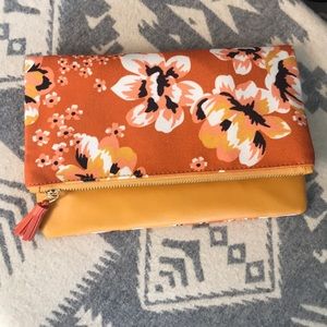 Rachel Pally, reversible clutch.